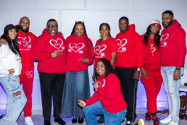 A group wearing red My Name Is Prayer Jesus heart hoodies and tees