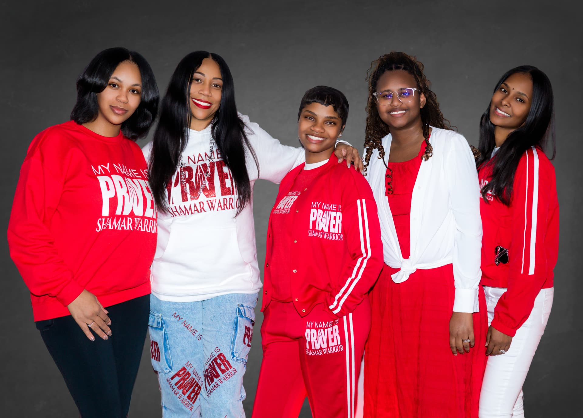 Members of the My Name Is Prayer movement in red and white brand apparel