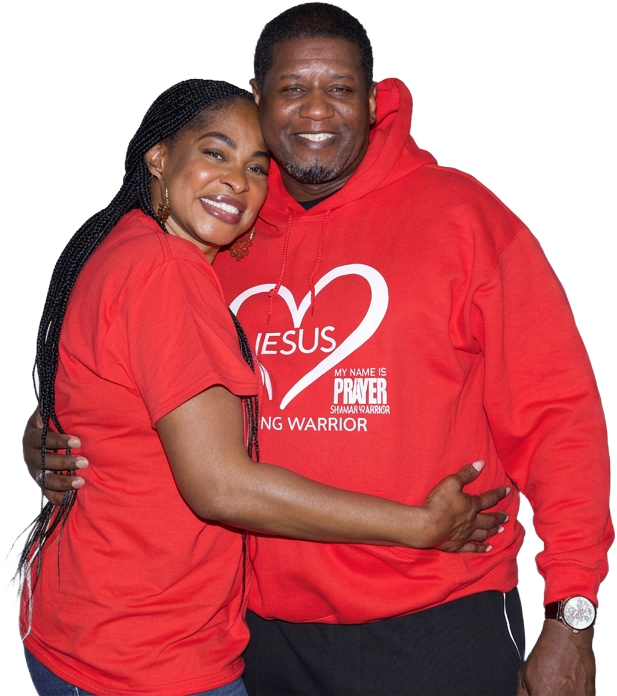 A couple embracing in red My Name Is Prayer Jesus heart tee and hoodie